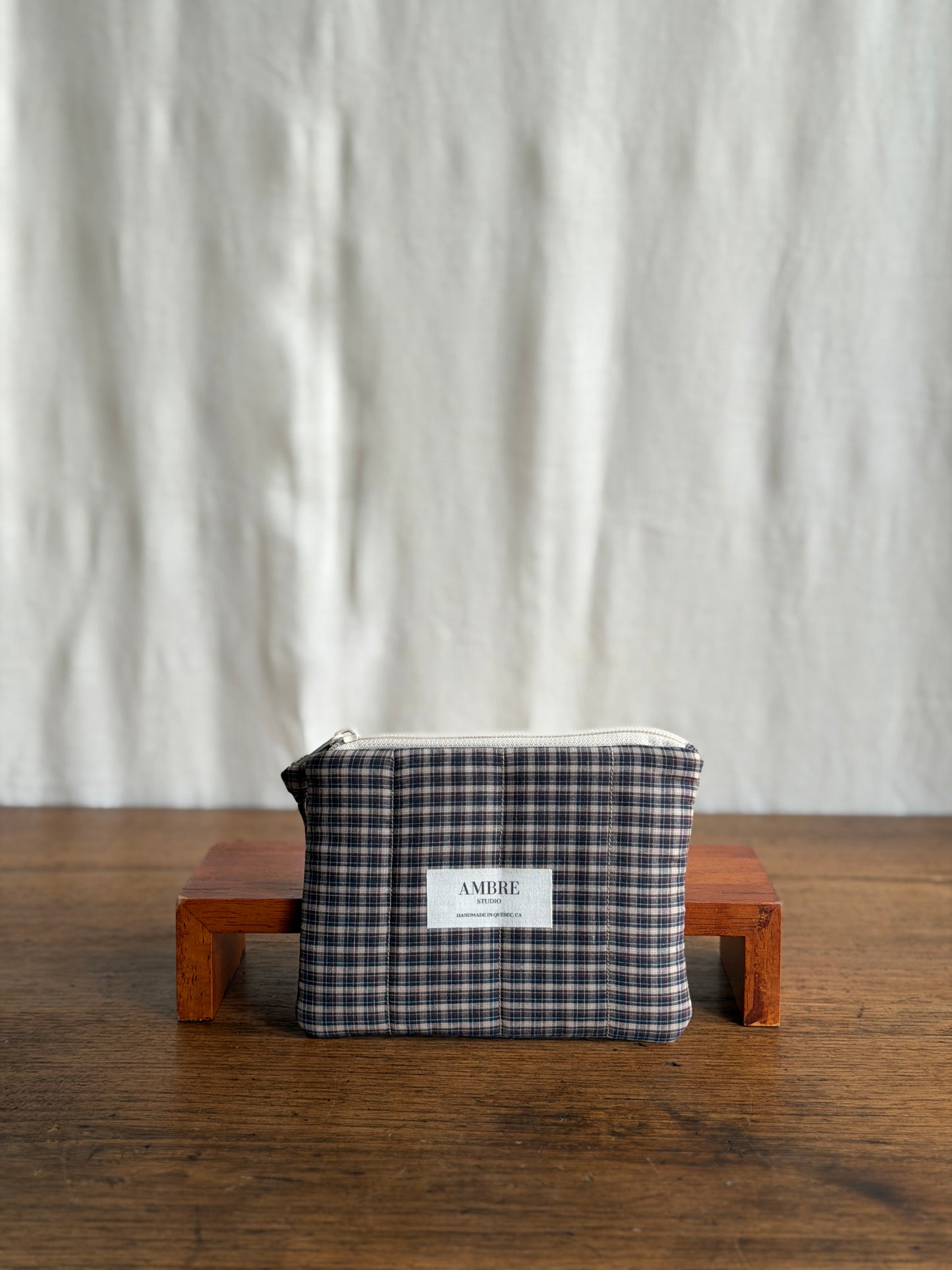 Petite pochette à carreaux bleu