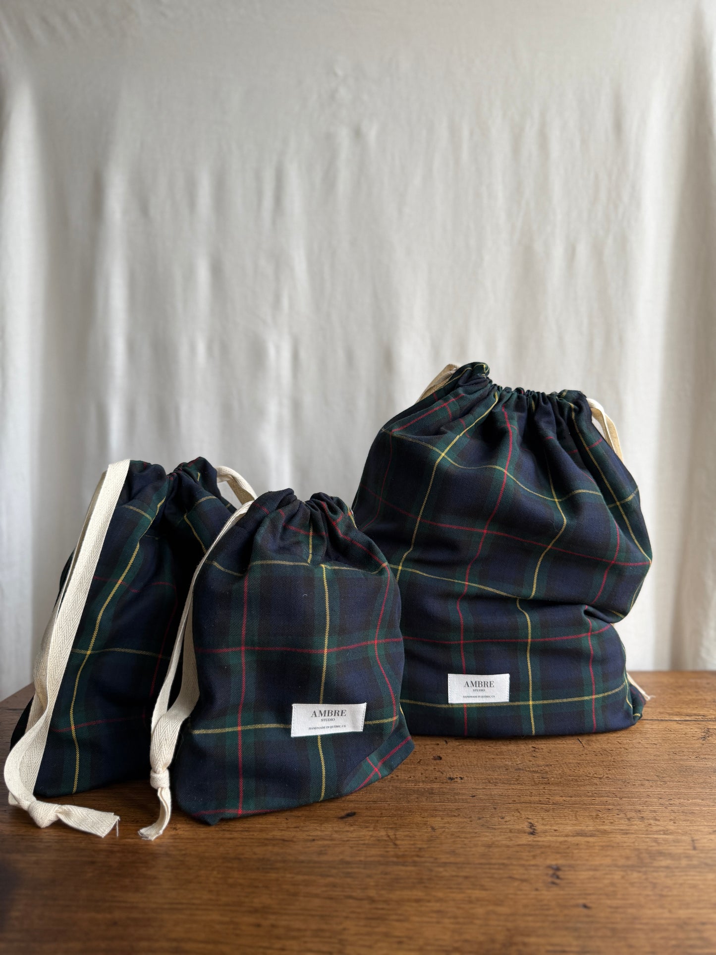 Trio de sacs en tissu à carreaux verts