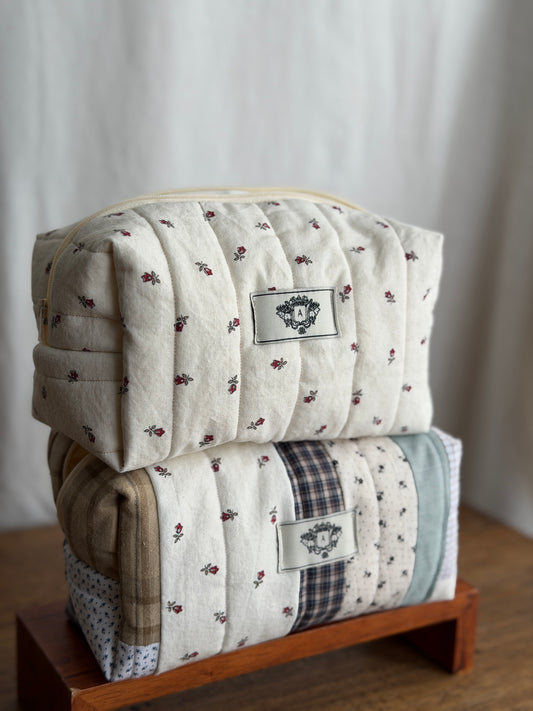 Trousse matelassé à fleurs
